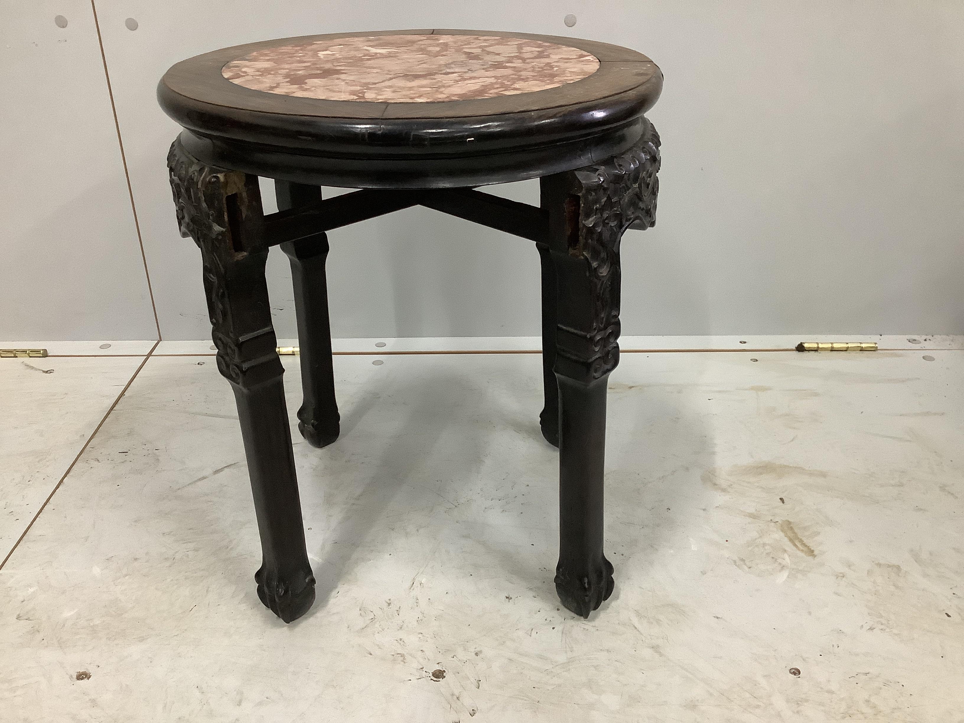 A Chinese circular rouge marble and hongmu jardiniere stand (losses), diameter 41cm, height 48cm together with a marble top mahogany two tier table